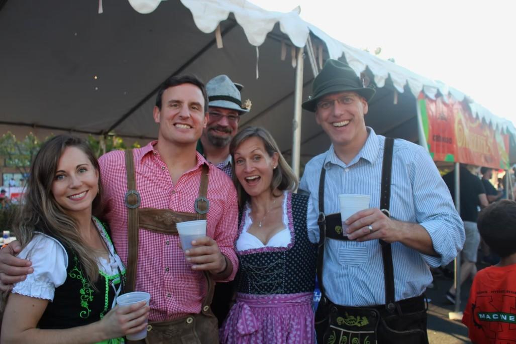 Friends under the Oktoberfest banner